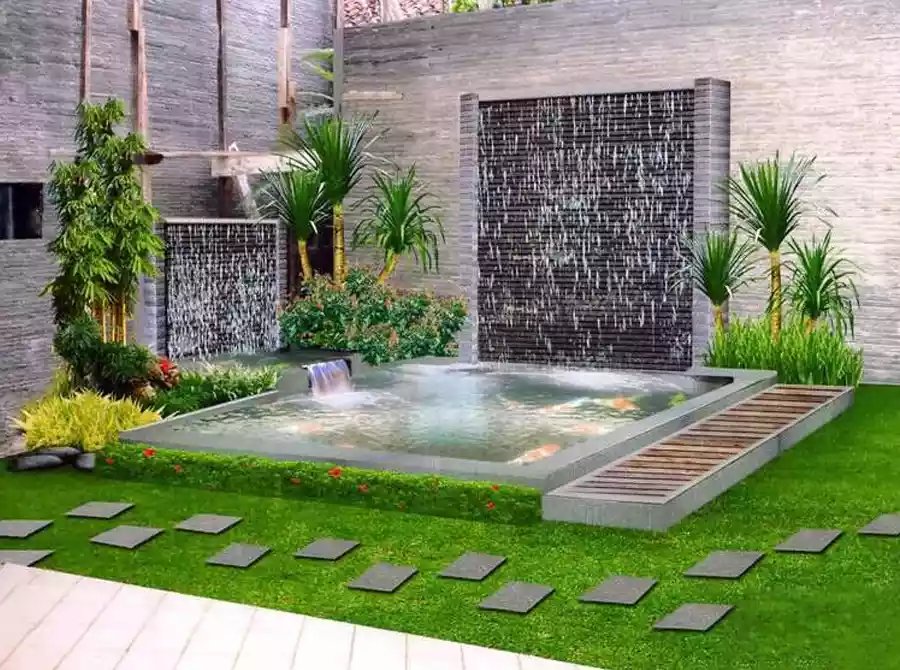Kolam Minimalis dengan Kombinasi Air dan Tanaman